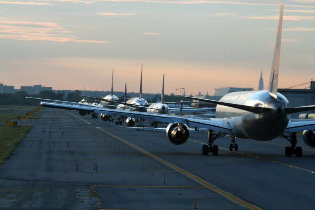 Airplanes awaiting take off. Osprey Flight Solutions can help you minimise diversions through their risk assessment tools.