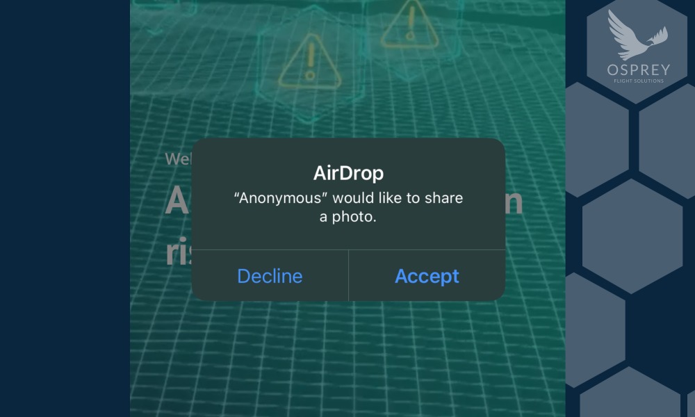 Screenshot of an anonymous airdrop notification on an aircraft, showcasing potential security risks related to in-flight data transfers.